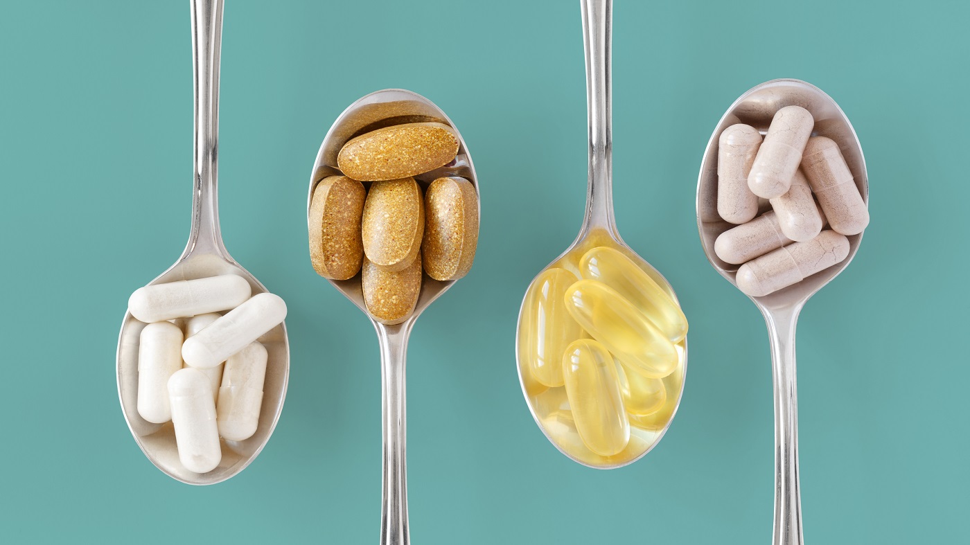 Vitamins & Minerals That Should Be Taken Together or Separately -- various vitamins in spoons